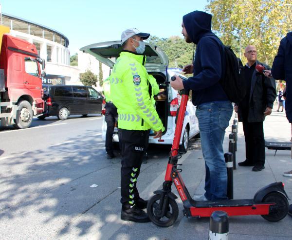 kaldirimdan-giden-yuk-tasiyan-scooter-kullanicilarina-ceza-yagdi-bvKFVqGY.jpg